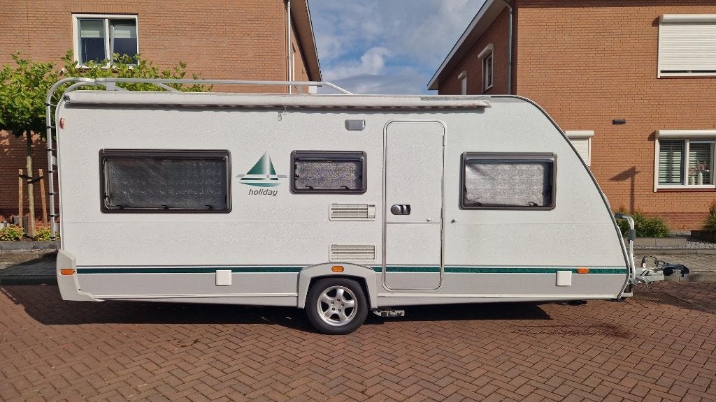 Zeer complete Eifelland Holiday 500TK, 1500kg TTM, Caravans en Kamperen, Vast bed, Schokbreker, 5 tot 6 meter, Tot en met 6