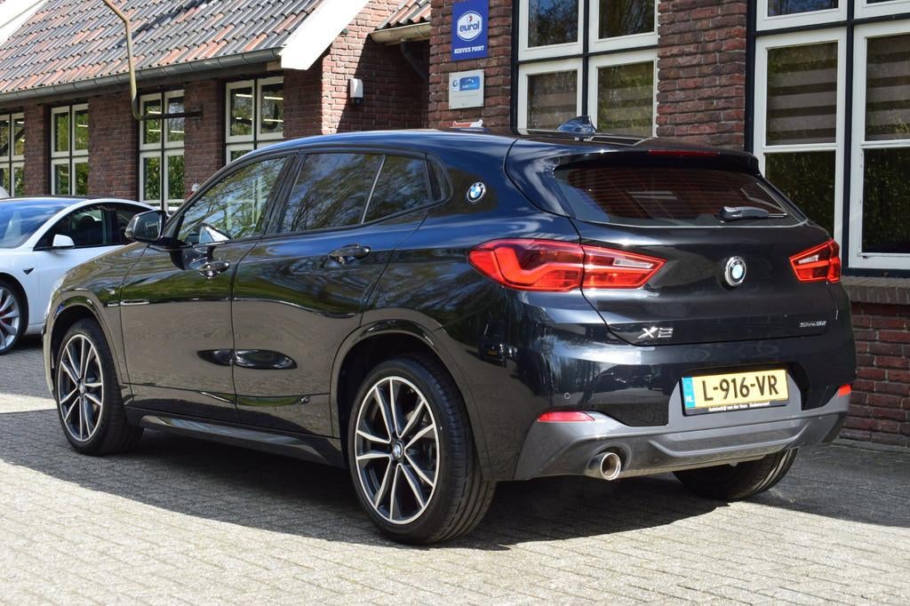BMW X2 1.8i sDrive Aut. M Pakket M Sport Lefhebber Edition, Auto's, X2, Gebruikt, Met garantie (alle), Zwart