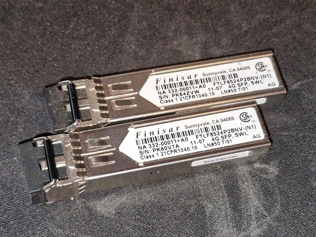 2x Finisar FTLF8524P2BNV 4/1G SFP Transceiver, Ophalen of Verzenden, Gebruikt
