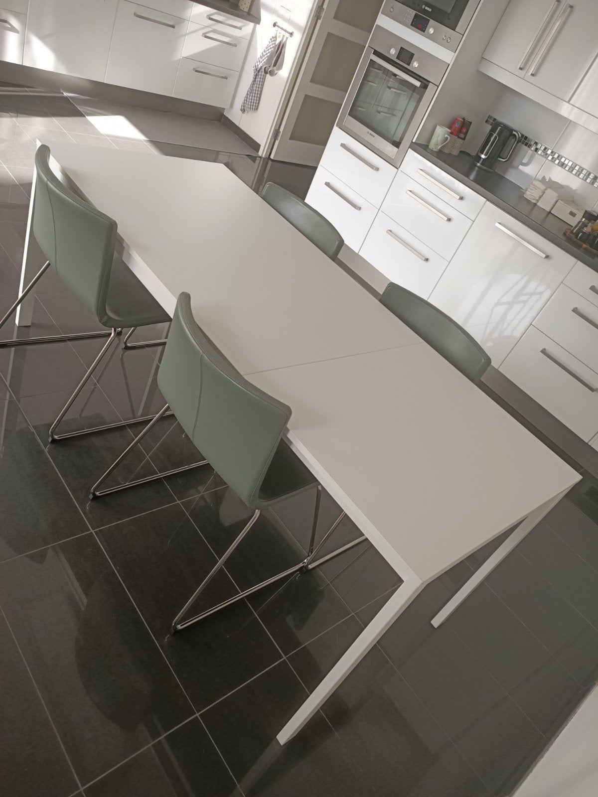 Foto 5 van Ikea VIHALS Uitschuifbare tafel, wit, 120/180x74 cm

Nieuwpr