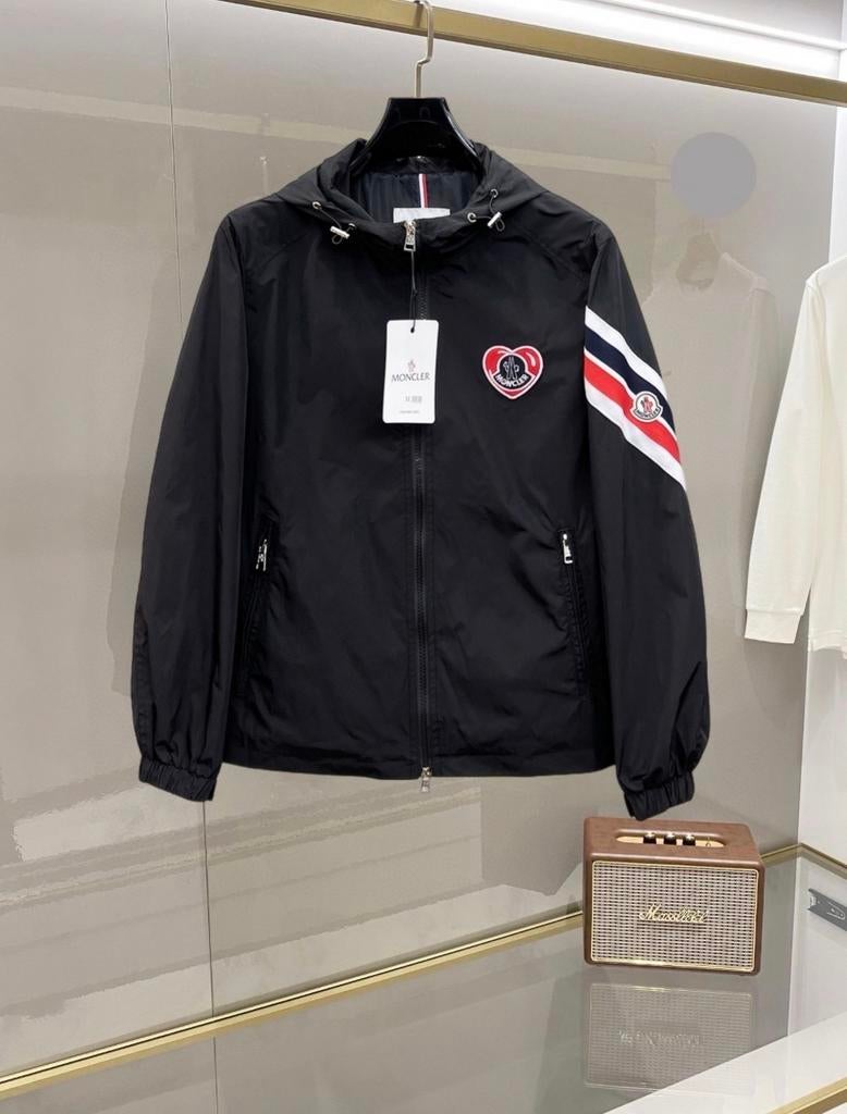 Moncler jas maat L - Zwart met logo en streepdetails, Ophalen of Verzenden, Zo goed als nieuw, Maat 52/54 (L), Zwart