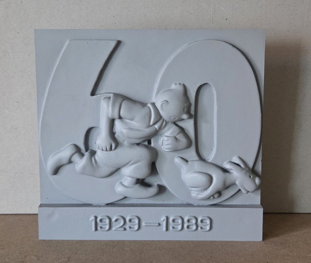 Kuifje 1929 - 1989 Gipsen plaquette., Eén stripboek, Ophalen of Verzenden, Zo goed als nieuw, Herge
