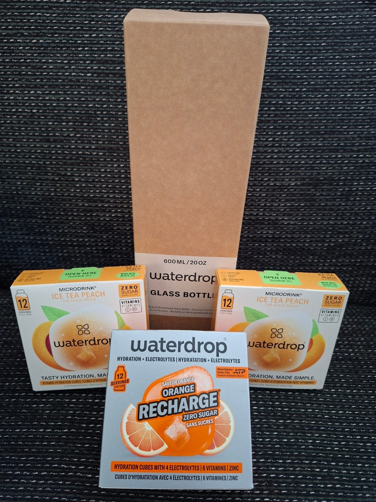 Nieuw: Waterdrop fles 600ml, recharge orange
+ ice tea peach, Ophalen of Verzenden