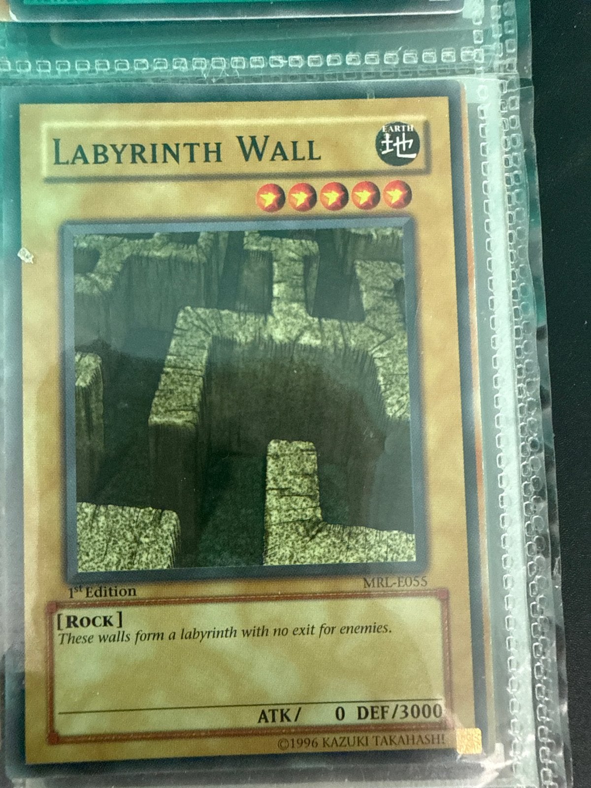 Yu-Gi-Oh! Labyrinth Wall 1st Edition MRL-E055, Ophalen of Verzenden, Gebruikt, Losse kaart