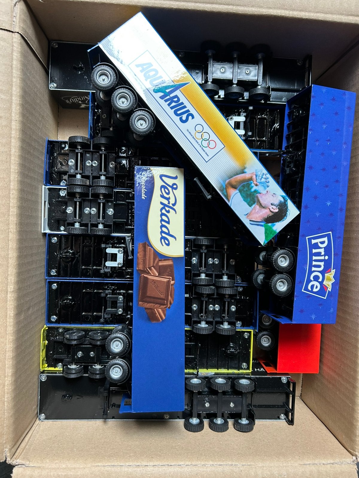 Doos vol met 13x Lion toys car trailers a €20 ex, Ophalen of Verzenden, Zo goed als nieuw, Bus of Vrachtwagen, Lion Toys