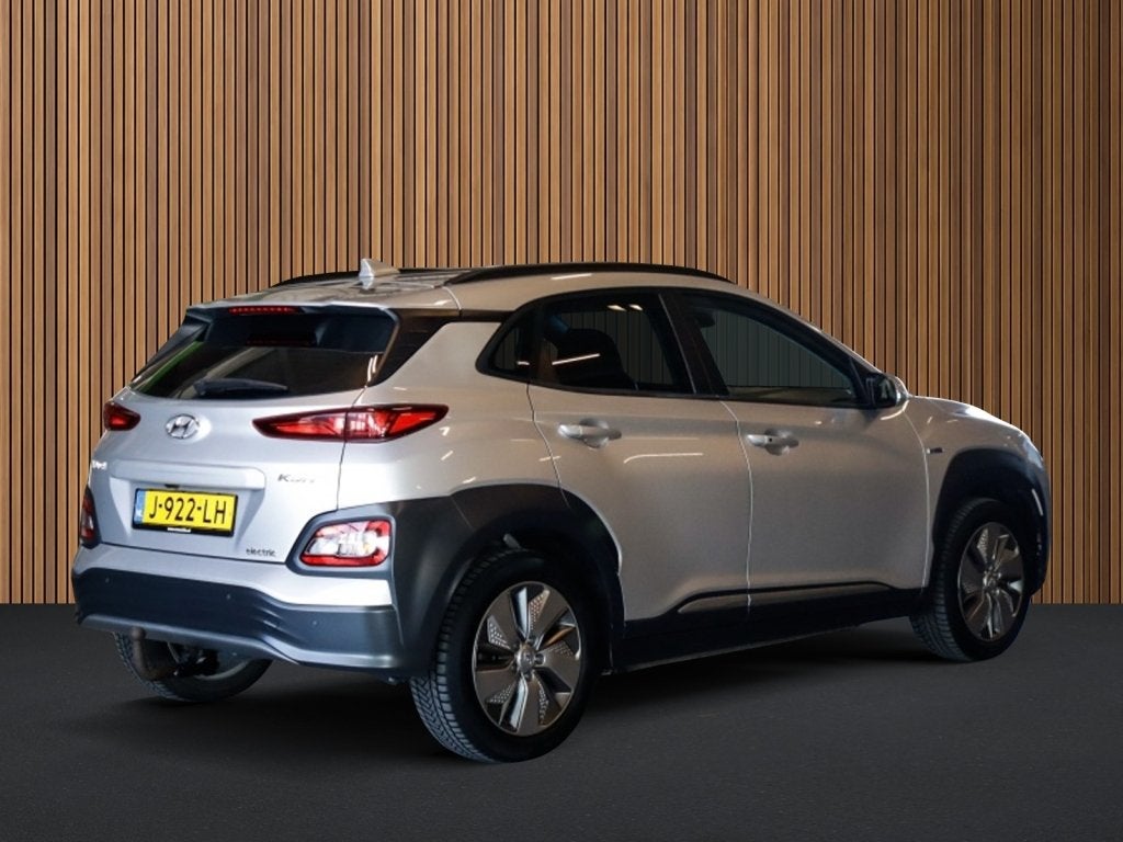Hyundai Kona EV Comfort 64 kWh 1e-Eig. & Dealer-Onderh BOVAG, Auto's, 12 maanden, Gebruikt, Zwart, Origineel Nederlands