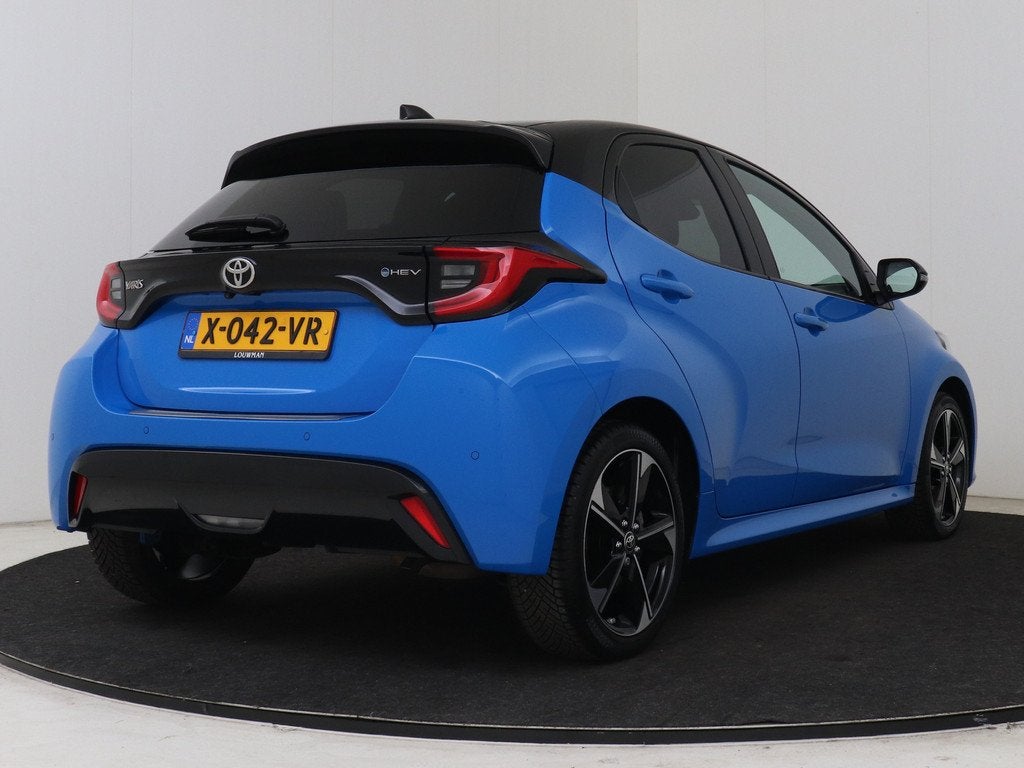 Toyota Yaris 1.5 Hybrid 130 Launch Edition | NL dealeronderh, Auto's, 12 maanden, 450 kg, Gebruikt, Blauw
