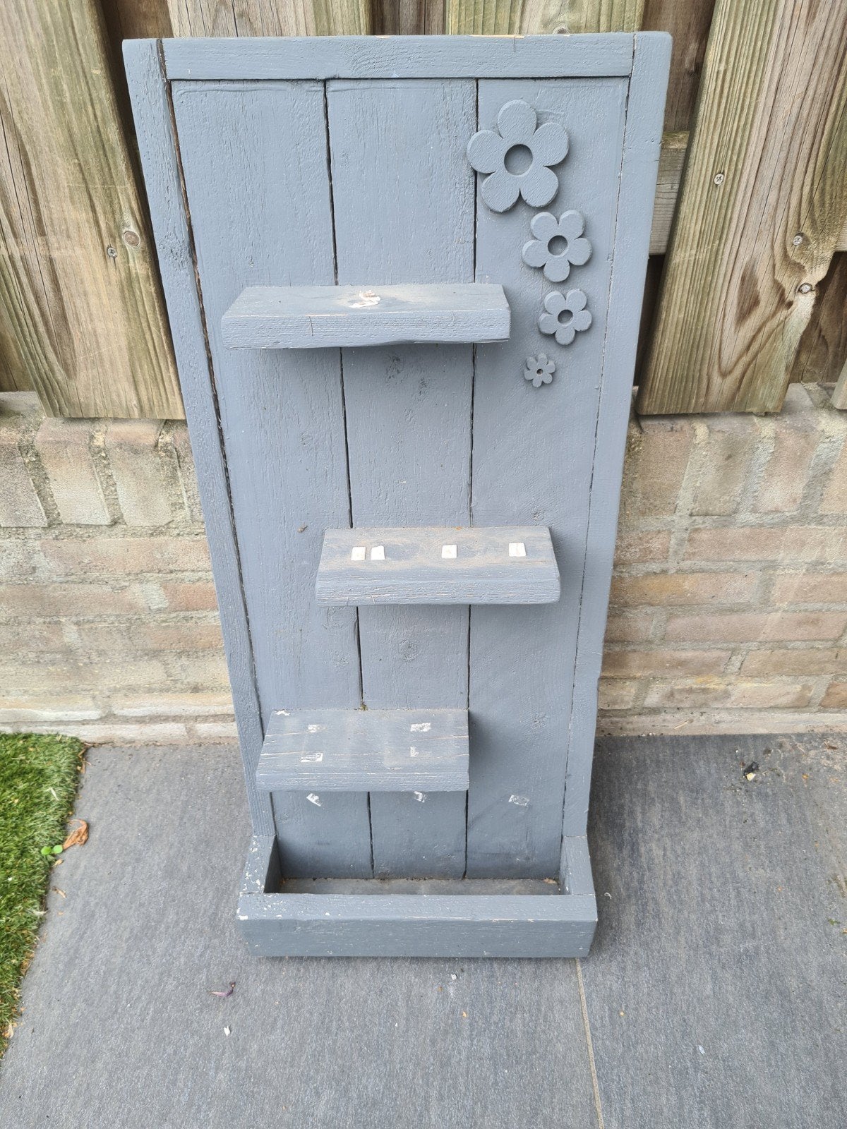 Houten wandbord, Ophalen