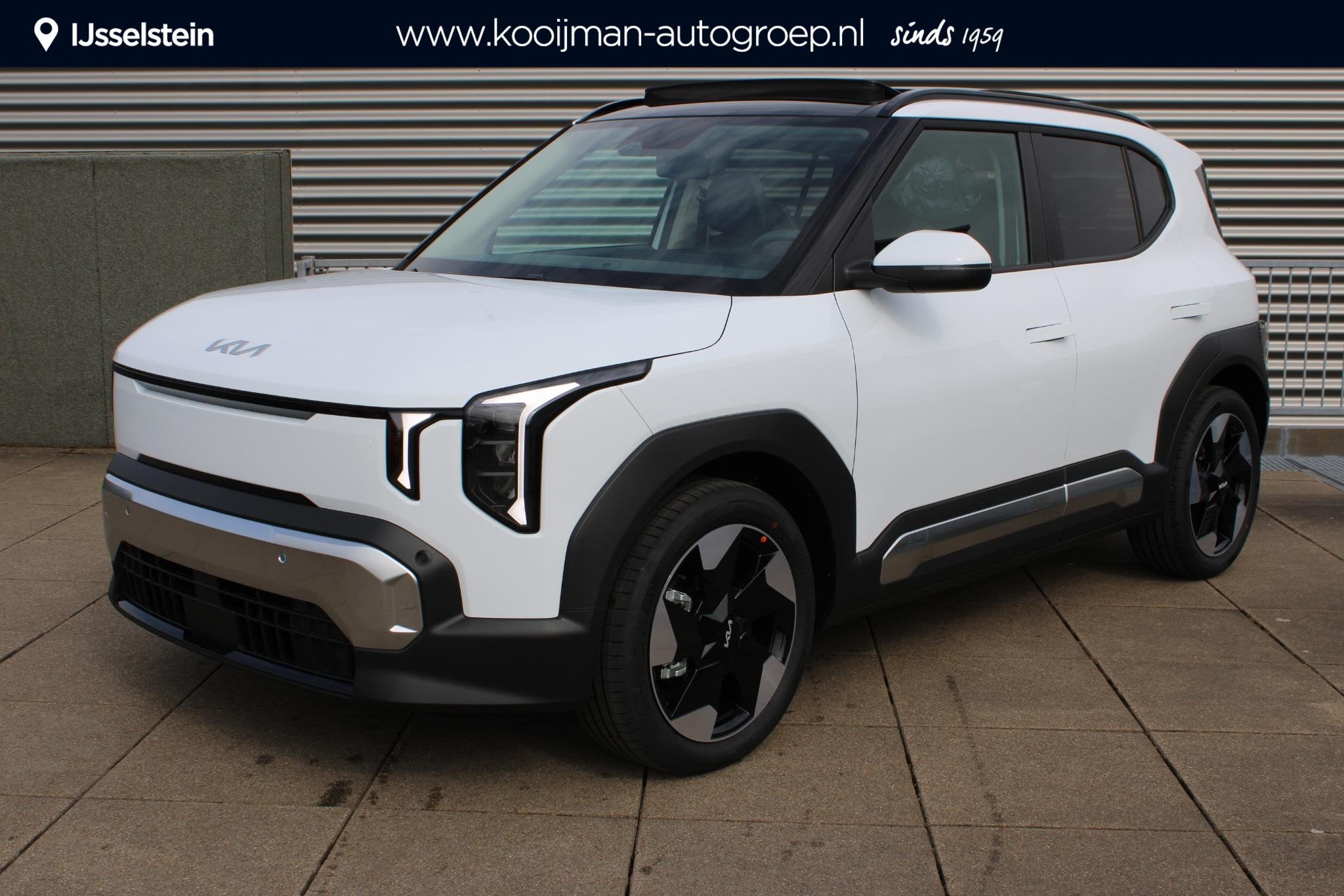 Kia EV2 Plus 42.2 kWh 4p. Stoel & stuurverwarming / Navi / D, Auto's, Kia, Stof, Overige modellen, 4 stoelen, Wit