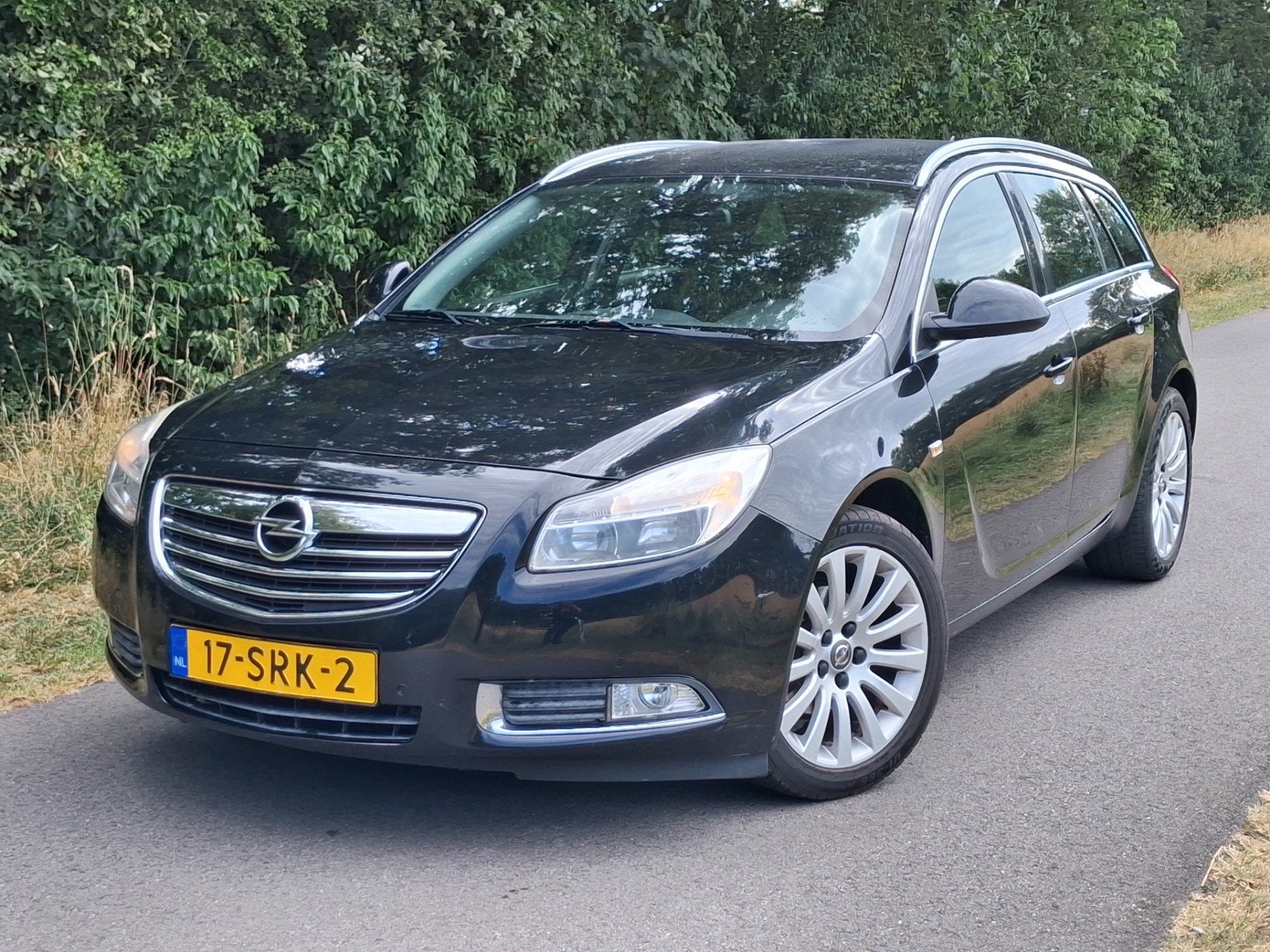 Opel Insignia Sports Tourer 1.4 Turbo EcoFLEX Business Editi, Auto's, Euro 5, Gebruikt, 4 cilinders, Zwart