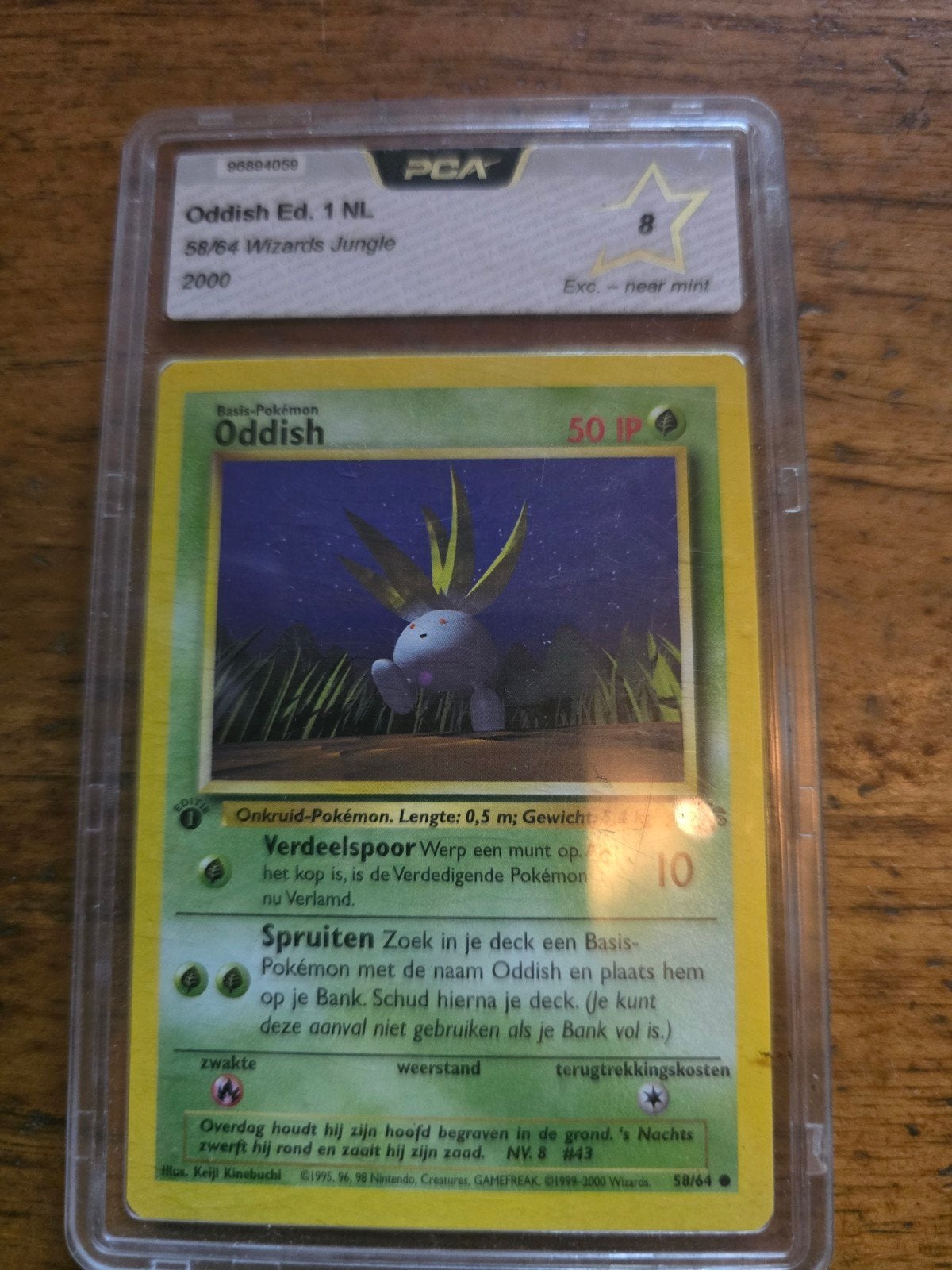 Oddish Ed. 1 NL PCA 8 Pokémon kaart 2000 Wizards Jungle, Hobby en Vrije tijd, Verzamelkaartspellen | Pokémon, Ophalen of Verzenden