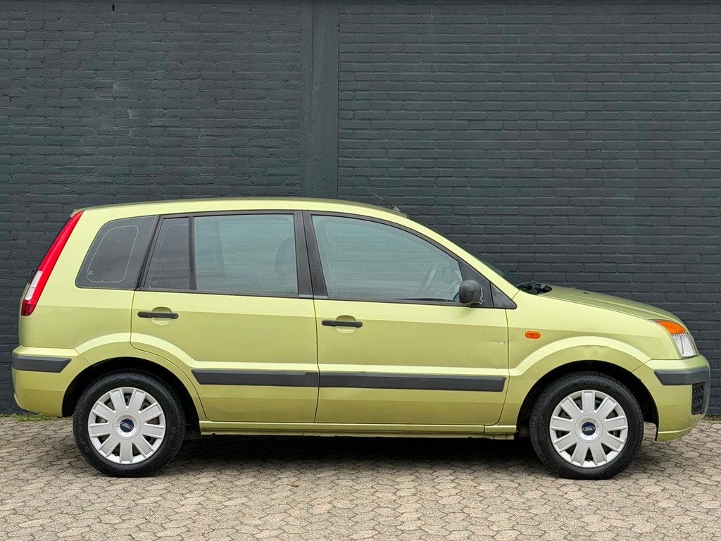 Ford Fusion 1.4-16V Champion NIEUW APK AIRCO BOEKJES, Auto's, Ford, Voorwielaandrijving, Gebruikt, Origineel Nederlands, Bedrijf