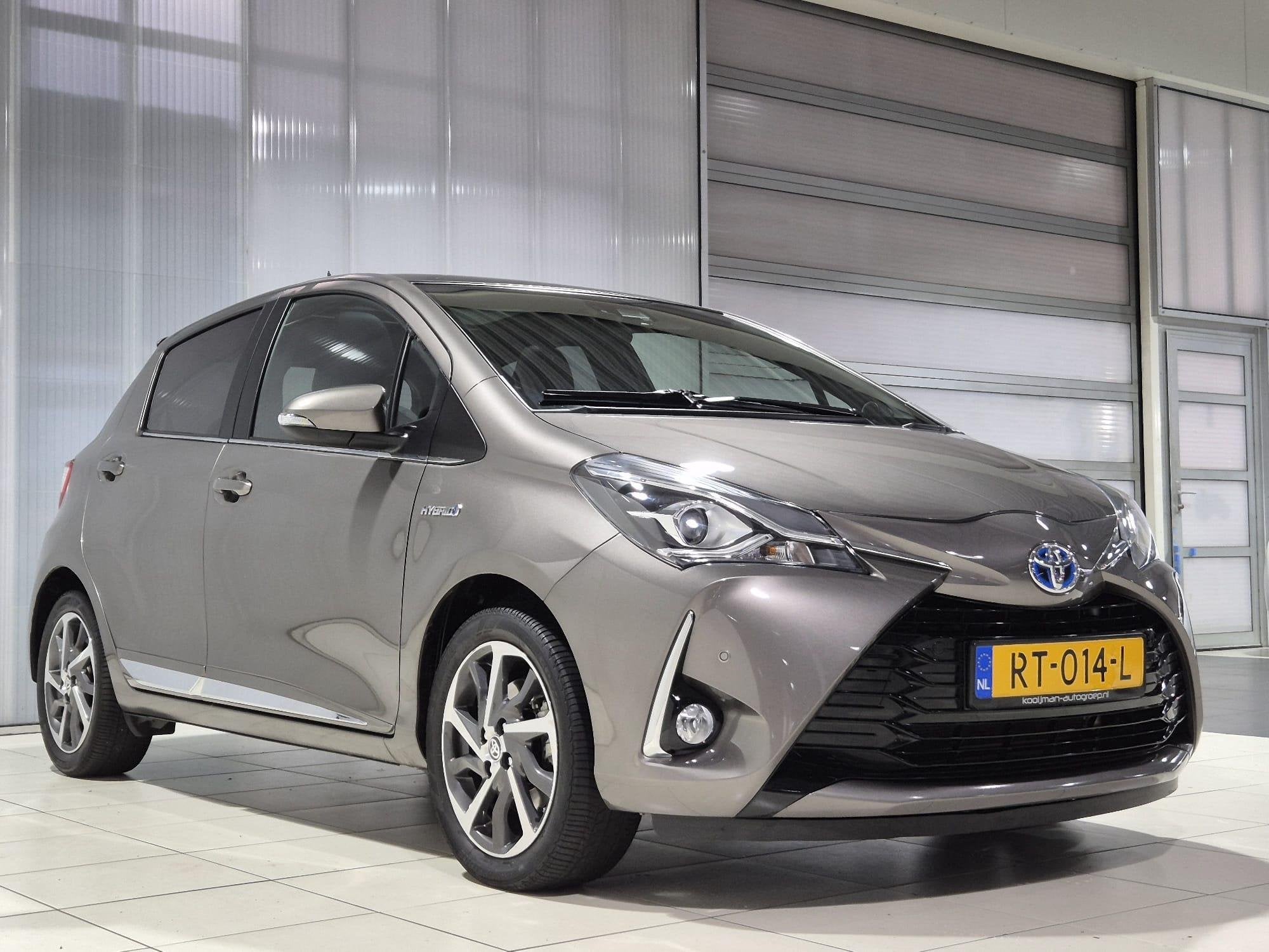 Toyota Yaris 1.5 Hybrid Premium Half lederen bekleding , Cam, Auto's, Toyota, Dealer onderhouden, Gebruikt, Euro 6, 4 cilinders