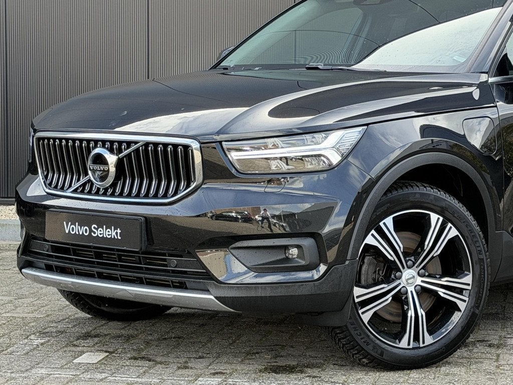 Volvo XC40 1.5 T4 Recharge Inscription leer/ intellisafe/ 36, Auto's, Volvo, Met garantie (alle), Zwart, Hybride Elektrisch/Benzine