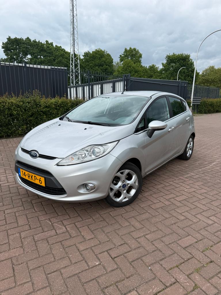 Ford Fiësta 1.4 Titanium | 5Deurs | NAP | Nieuwe APK | 2011, Auto's, Voorwielaandrijving, 40 €/maand, Elektrische ramen, Origineel Nederlands