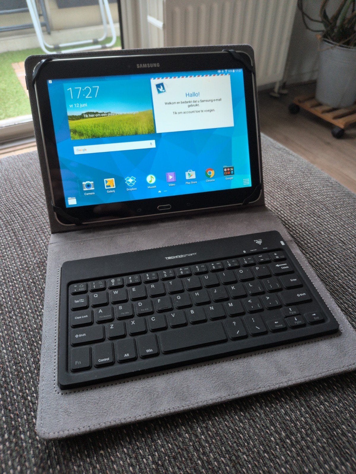 Samsung Galaxy Tab 4 (SM-T530) met toetsenbordhoes, 10 inch, Ophalen of Verzenden, Samsung, Galaxy Tab 4 (SM-T530)