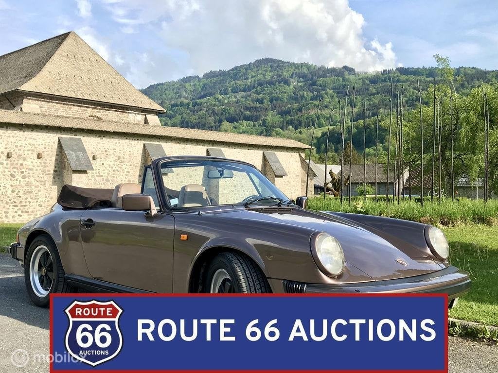 Porsche 911 Carrera 3.2 Cabriolet | 1984 | Route 66 Auctions, Auto's, Oldtimers, Overige carrosserieën, Zwart, Bedrijf, Porsche