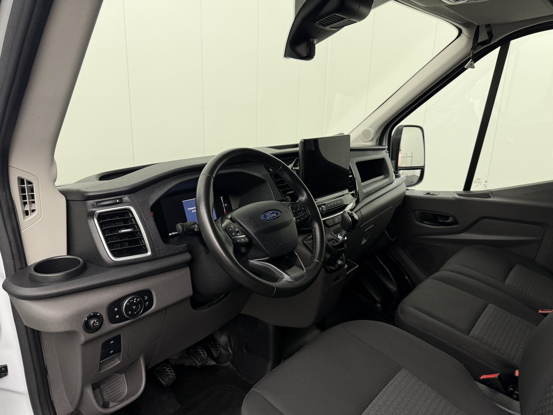 Ford Transit 2.0TDCi 130PK L4H3 Jumbo | Multimedia | Camera, Gebruikt, 2500 kg, Wit, Multifunctioneel stuurwiel