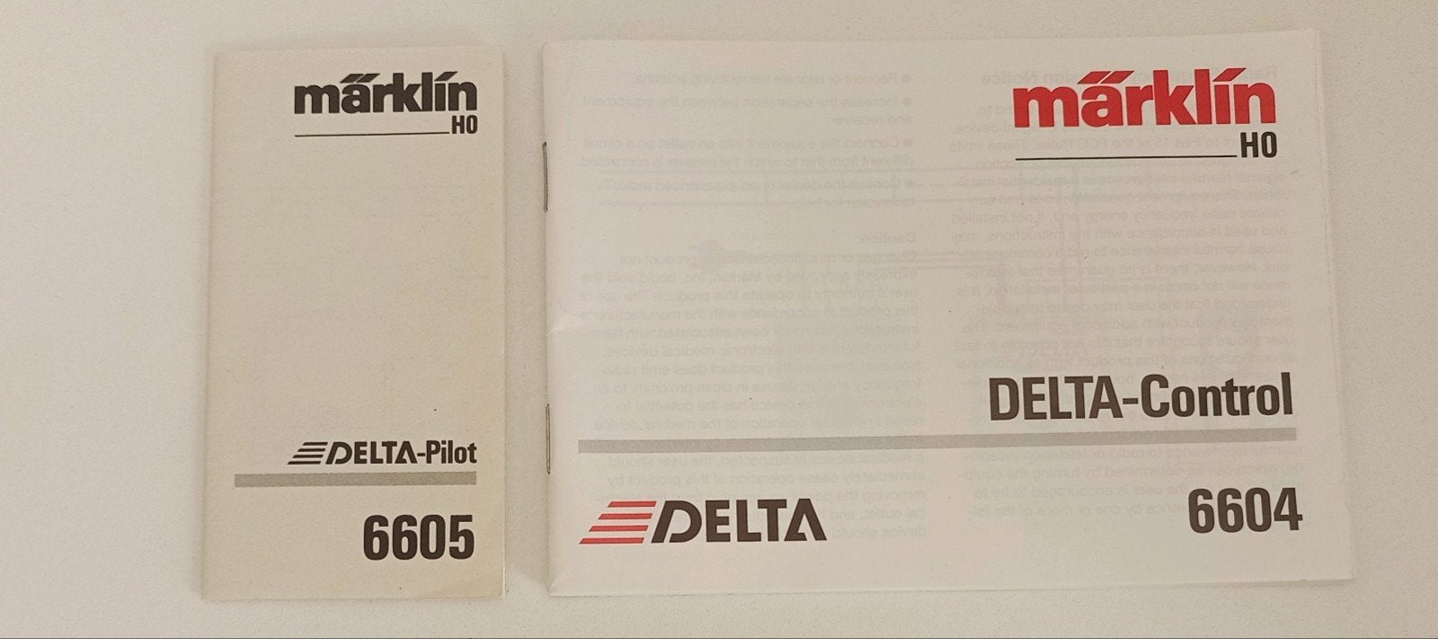 Märklin Delta control 6604 & Delta pilot 6605 handleiding, Ophalen of Verzenden, Zo goed als nieuw, Märklin, Transformator of Voeding