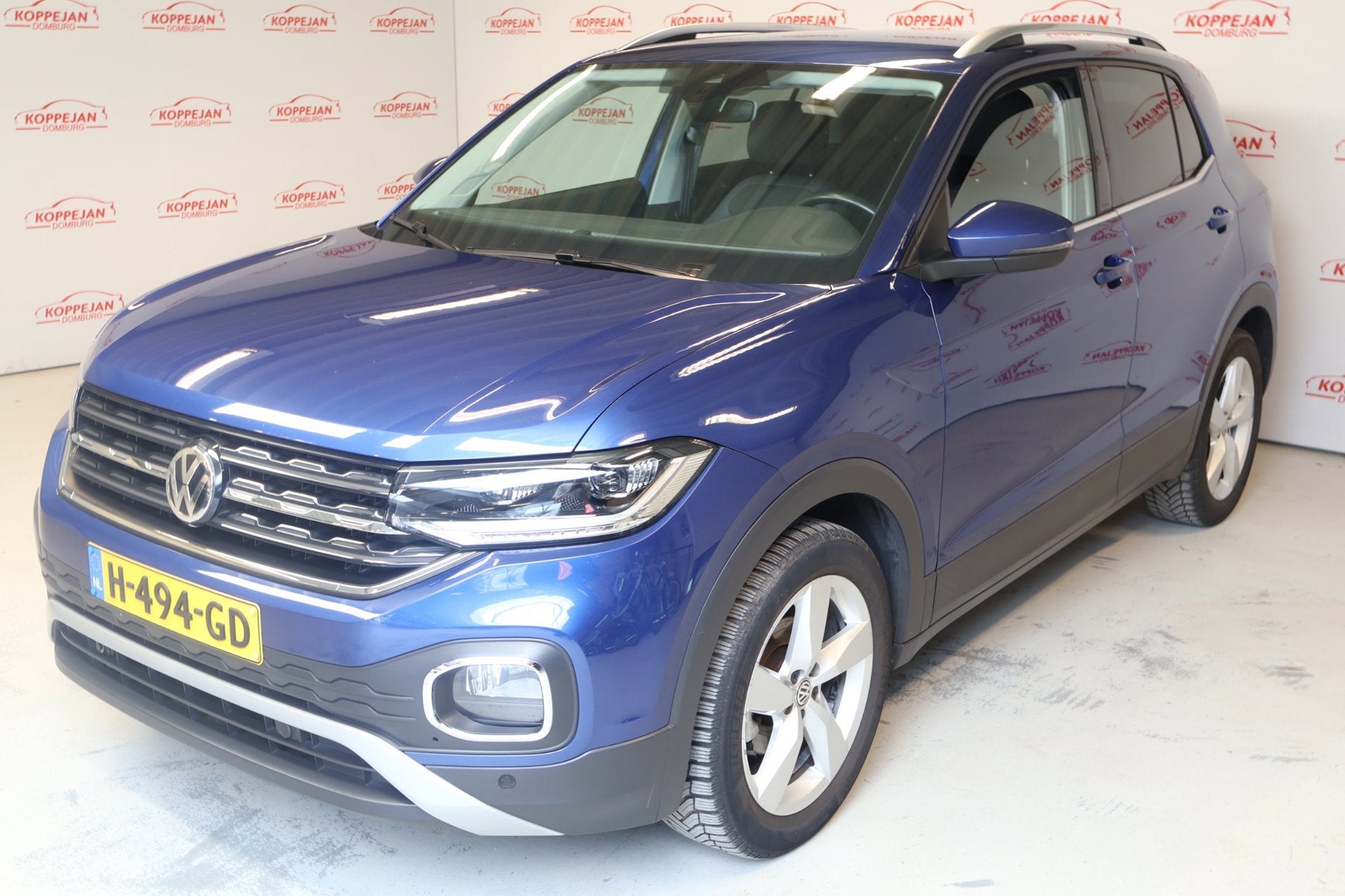 Volkswagen T-Cross 1.0 TSI Style NL auto, ACC, Trekhaak, App, Gebruikt, Blauw, 116 pk, 1175 kg
