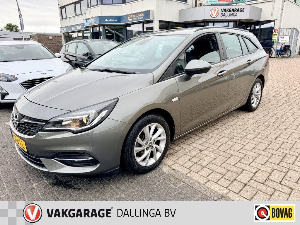 Opel Astra Sports Tourer 1.4 Business Edition (bj 2020), Auto's, Opel, Automaat, Stof, Gebruikt, 146 pk