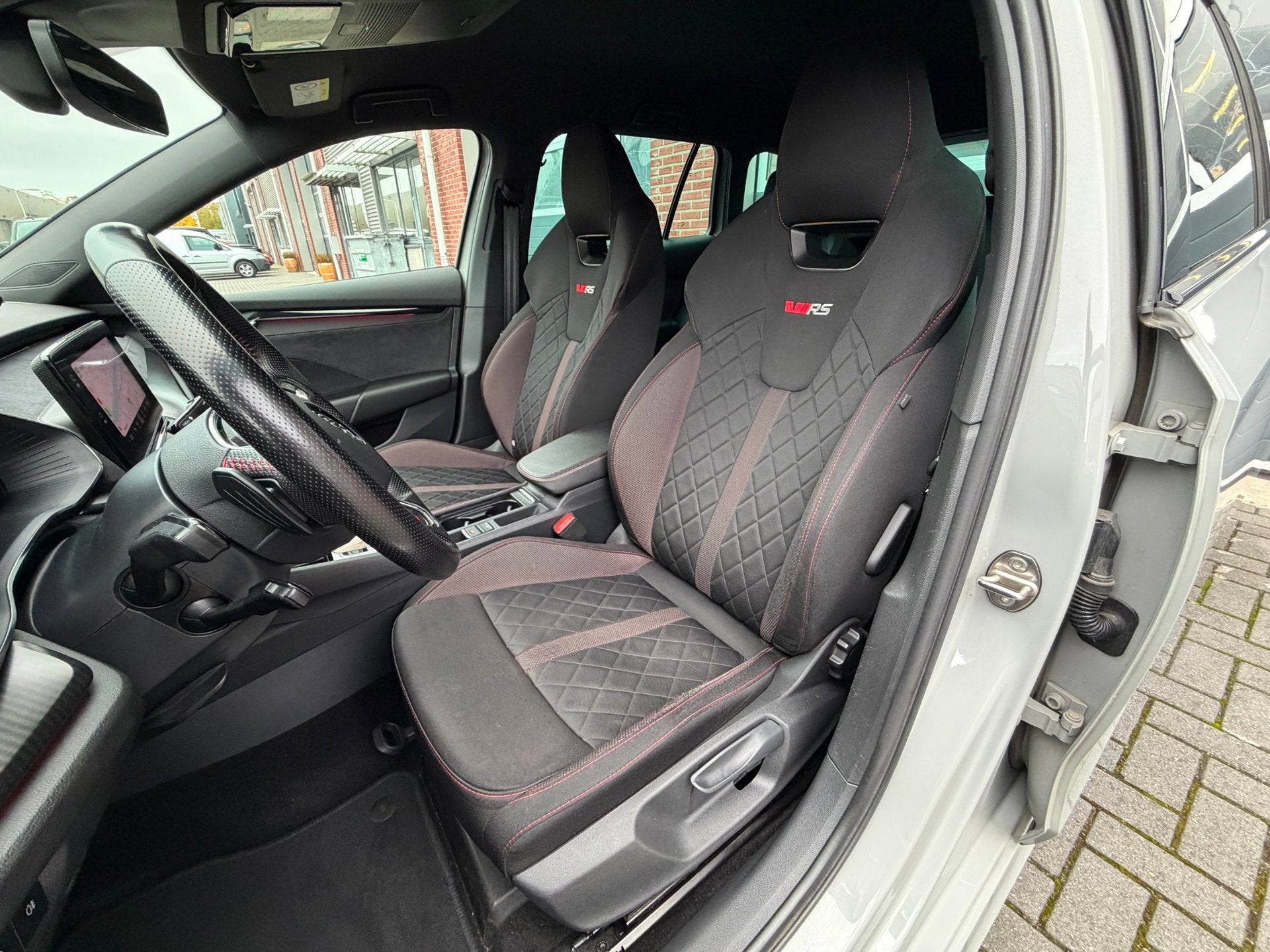 Skoda Octavia Combi 1.4 TSI RS iV PHEV ACC HUD Canton Camera, Auto's, Dealer onderhouden, Gebruikt, Euro 6, 4 cilinders