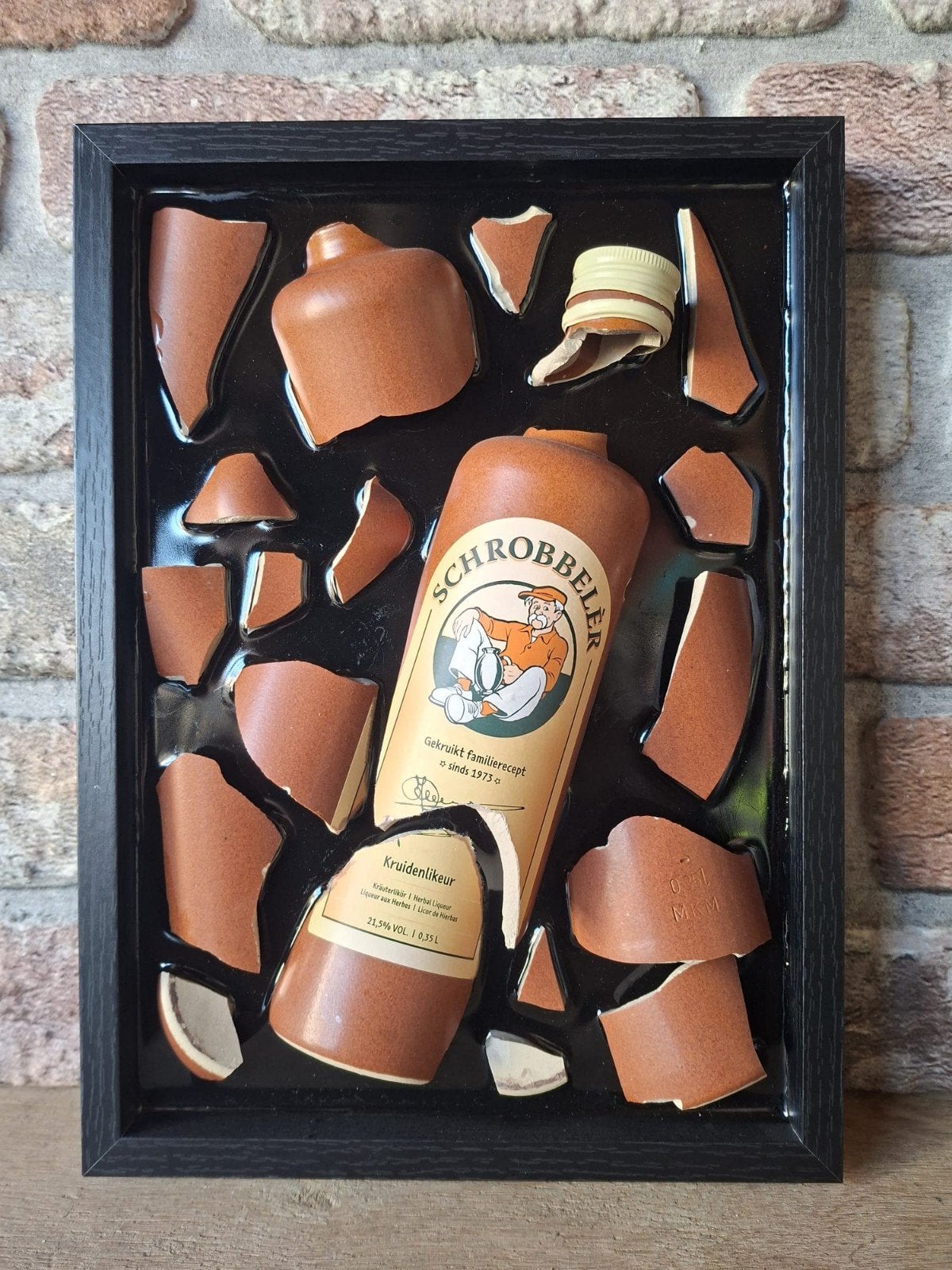 Schrobbelèr fles verwerkt in een lijst (23x33) met Epoxy, Ophalen of Verzenden