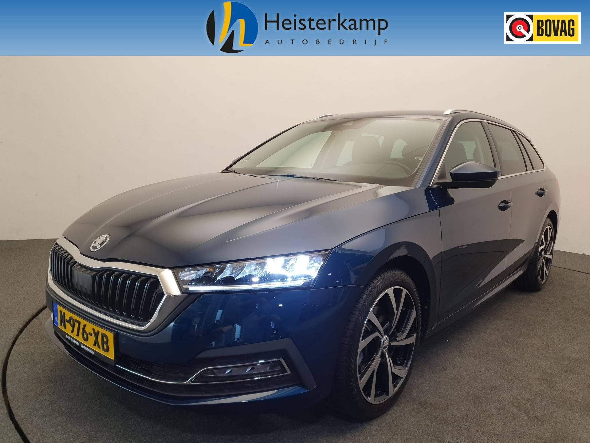 Skoda Octavia Combi 1.0 e-TSI Business Edition Trekhaak, ACC, Auto's, Stof, Gebruikt, Blauw, Parkeersensor