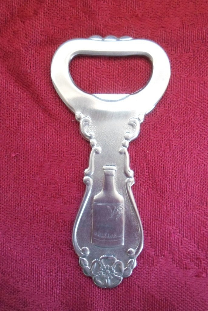 Flesopener. Hero "De Parel der Drank" Verzilverd. Sola., Ophalen of Verzenden, Gebruiksvoorwerp