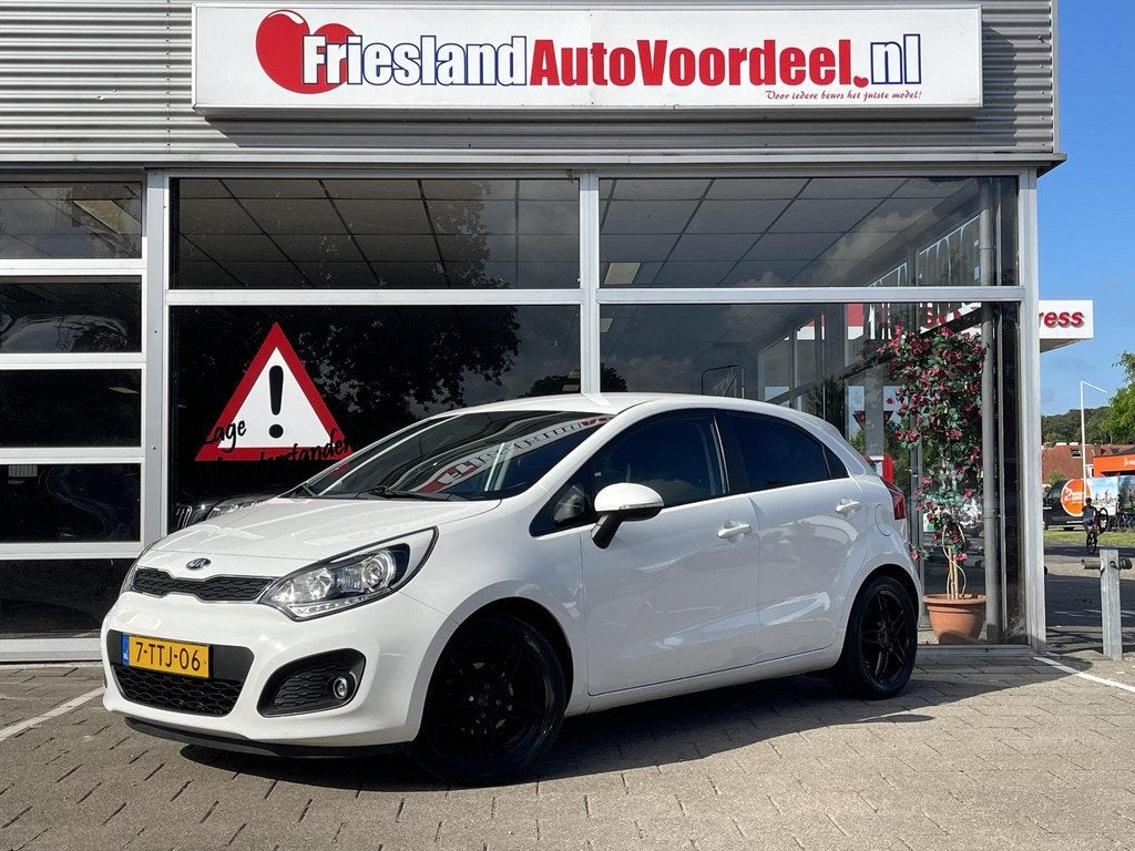 Kia Rio 1.2 CVVT World Cup Edition /Cruise/Clima/Leder/Parke, Auto's, Kia, Bedrijf, Te koop, Rio, ABS, Airbags, Airconditioning