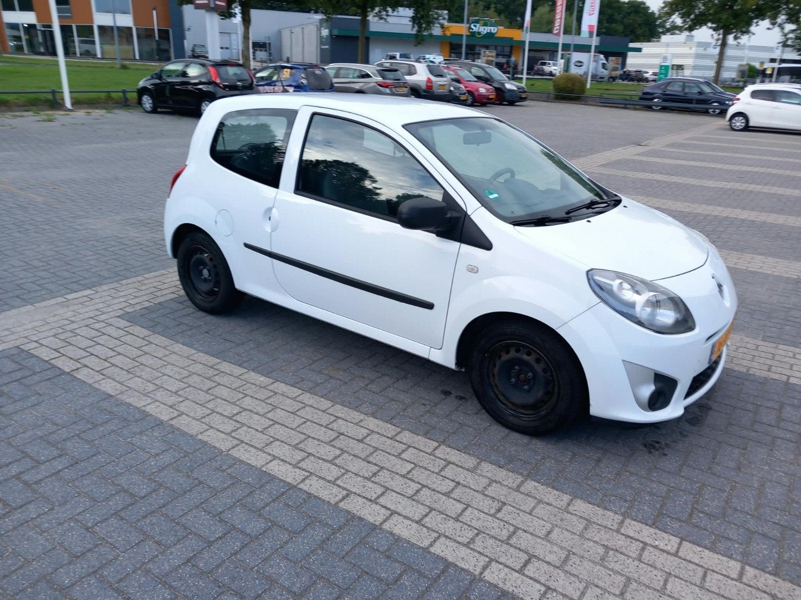 Renault Twingo 1.2 16V 2011 Wit, Auto's, 839 kg, 74 pk, 4 cilinders, 4 stoelen