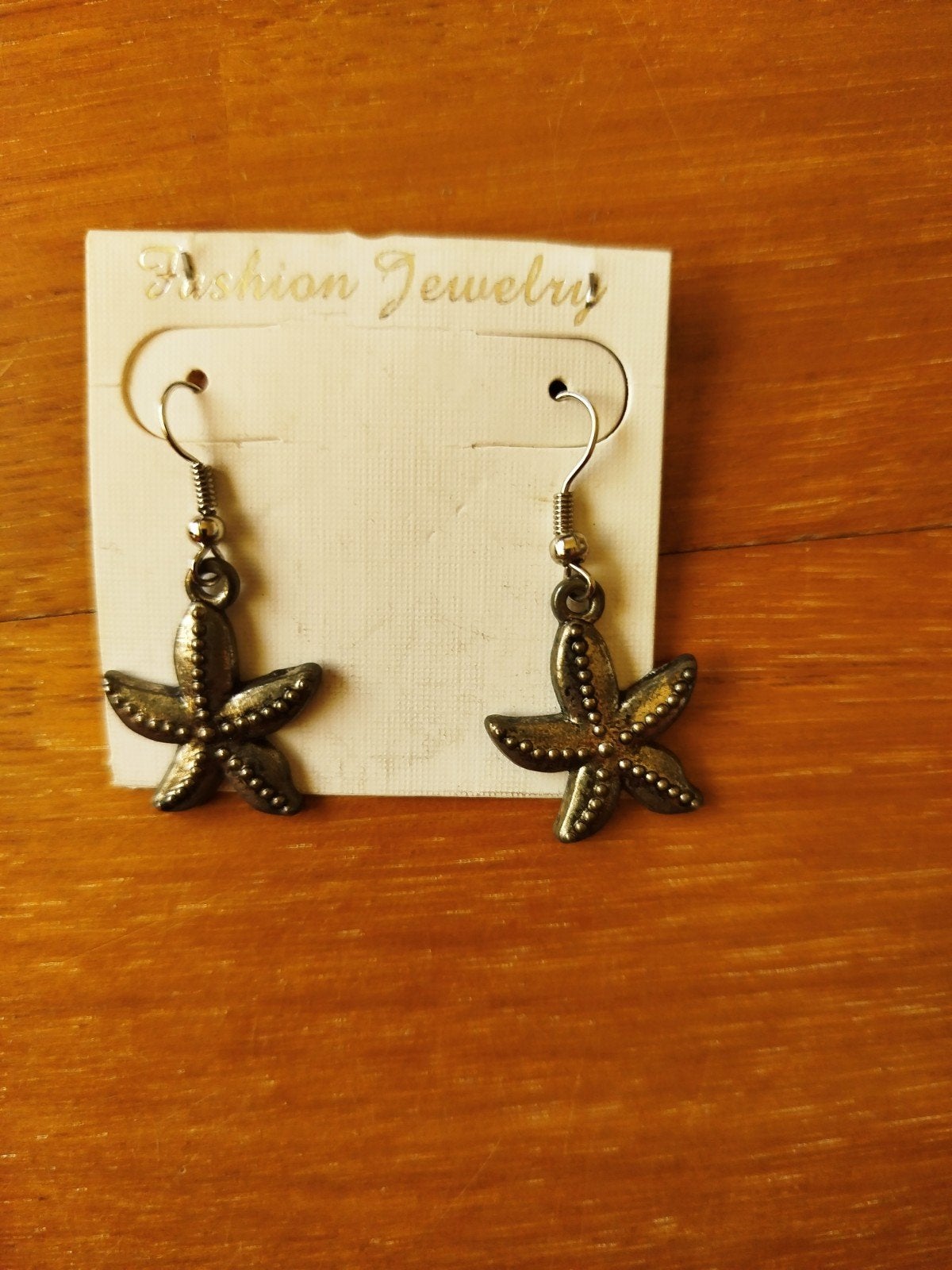 Zilverkleurige Zeester Oorbellen, Sieraden, Tassen en Uiterlijk, Oorbellen, Overige materialen, Hangers, Nieuw, Ophalen of Verzenden