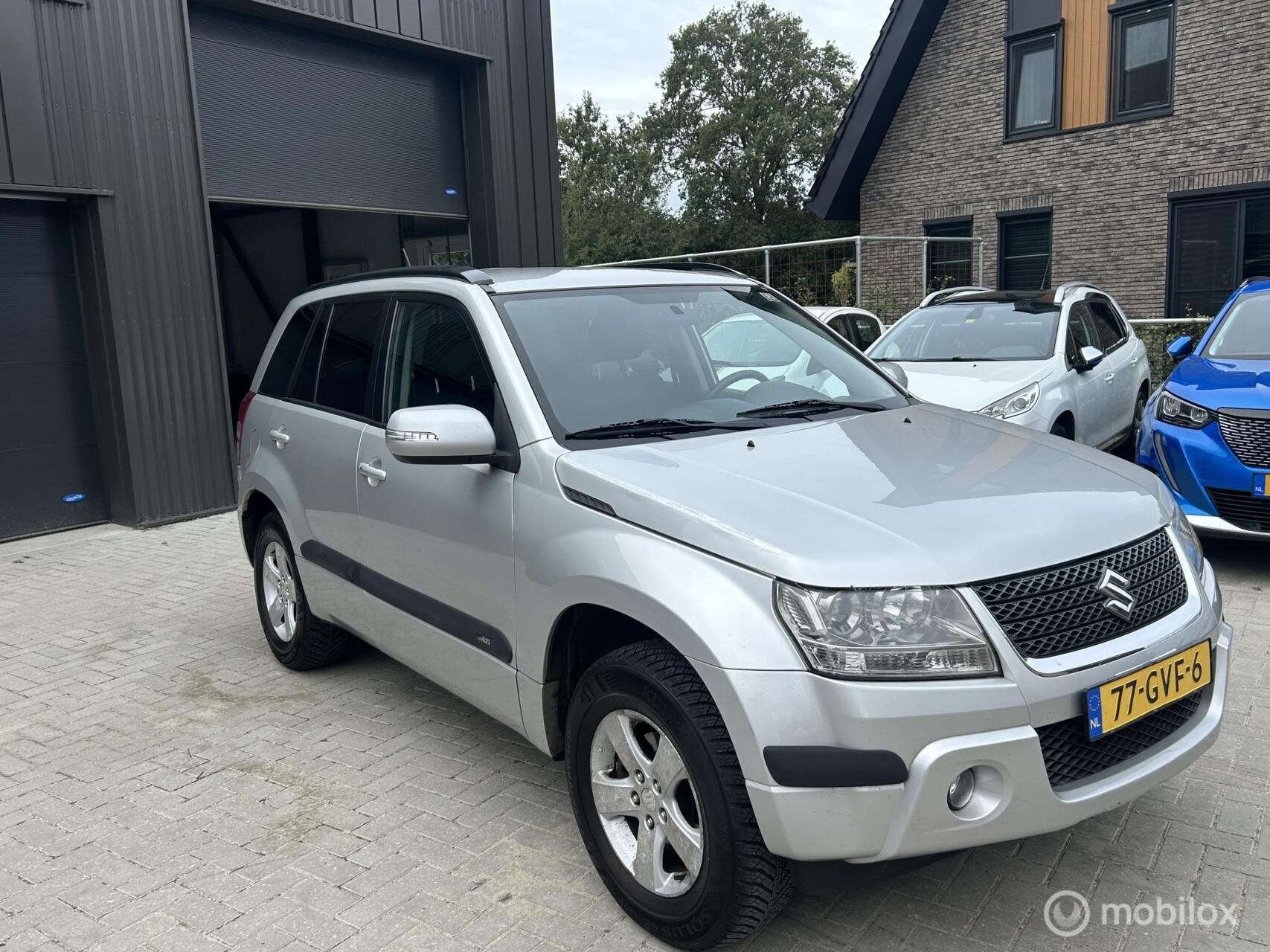 Suzuki Grand Vitara 2.0-16V Exclusive, Auto's, Dealer onderhouden, 4 cilinders, 1850 kg, Grand Vitara