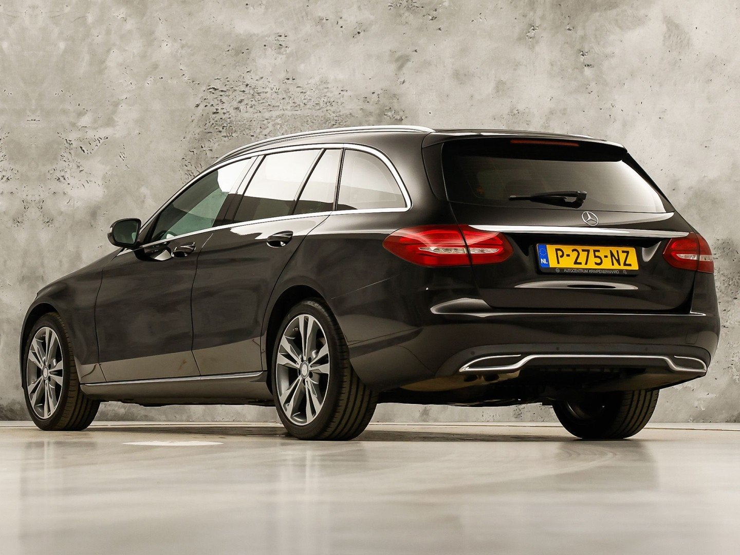 Mercedes-Benz C-Klasse 180 AMG Sport Automaat (GROOT NAVI, L, Automaat, Achterwielaandrijving, Leder en Stof, Zwart
