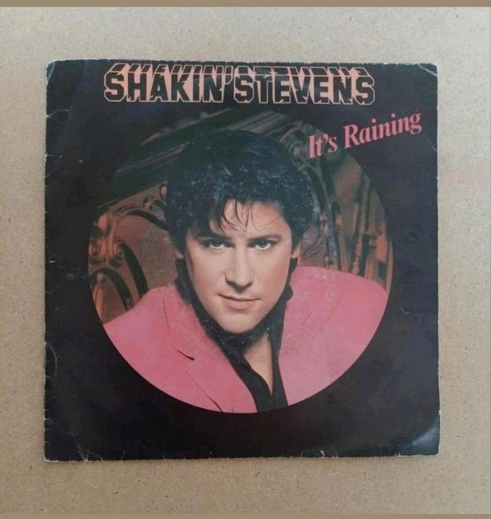 Shakin' Stevens  - It's Raining, Beschermende buitenhoes, Ophalen of Verzenden, Gebruikt, Pop