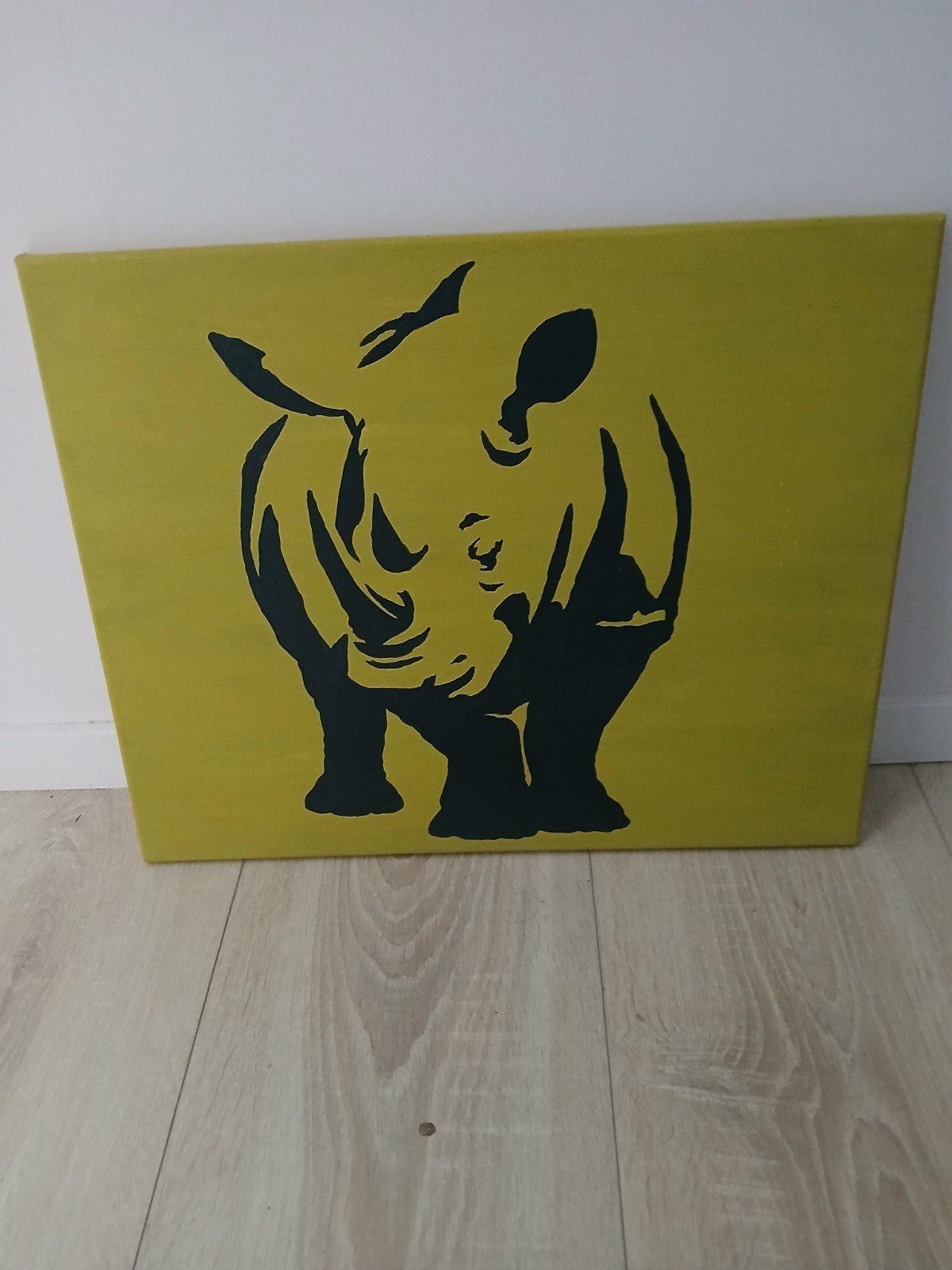 schilderij neushoorn, Ophalen