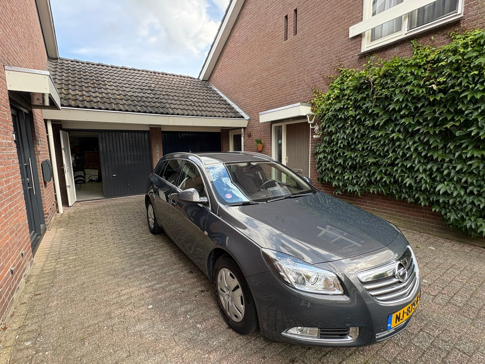 Opel Insignia 1.4 Turbo 103KW Sports Tourer 2013 Grijs, Stof, Zwart, 4 cilinders, Handgeschakeld