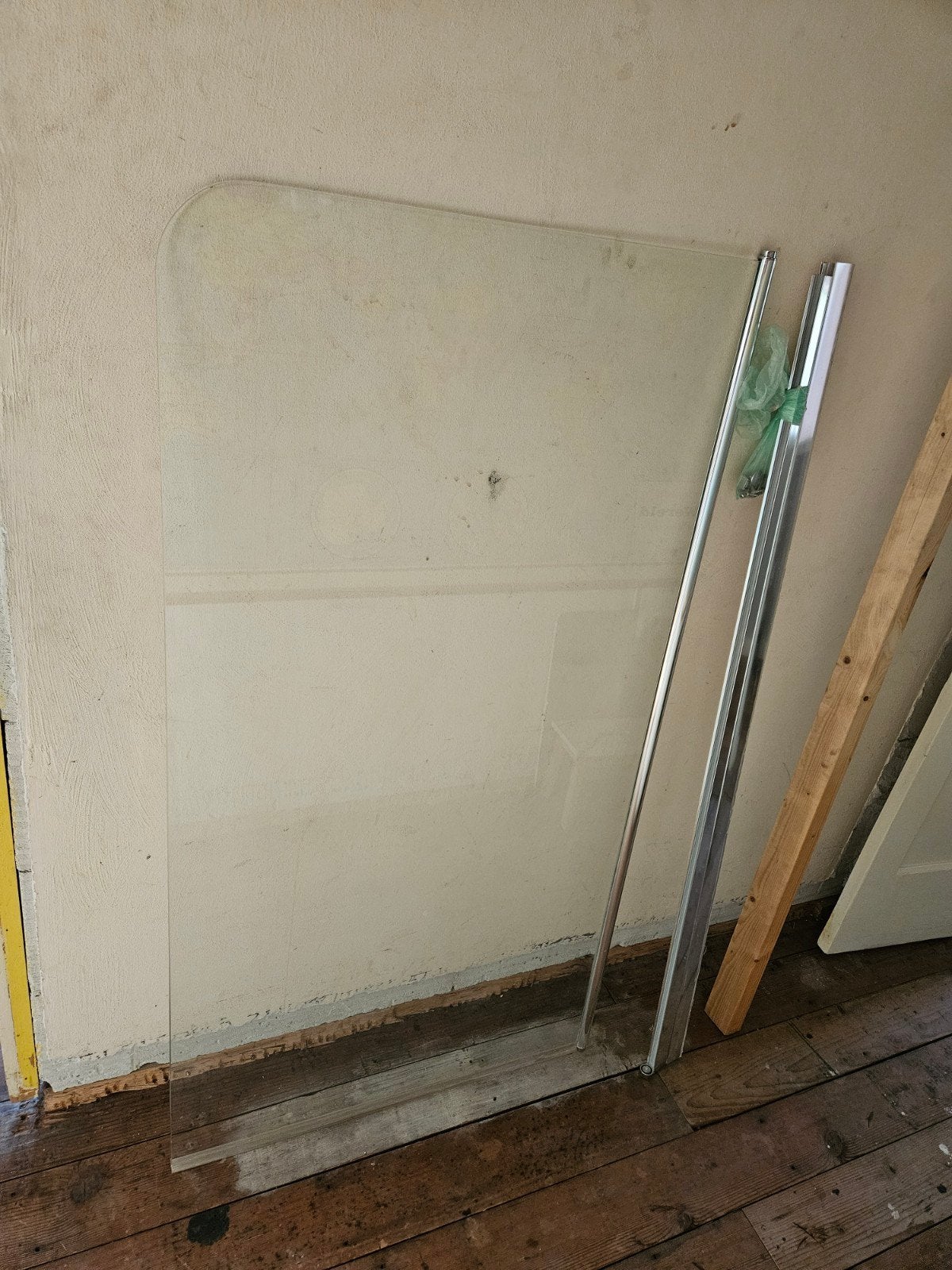 draaibare douchewand voor op de badrand, Ophalen