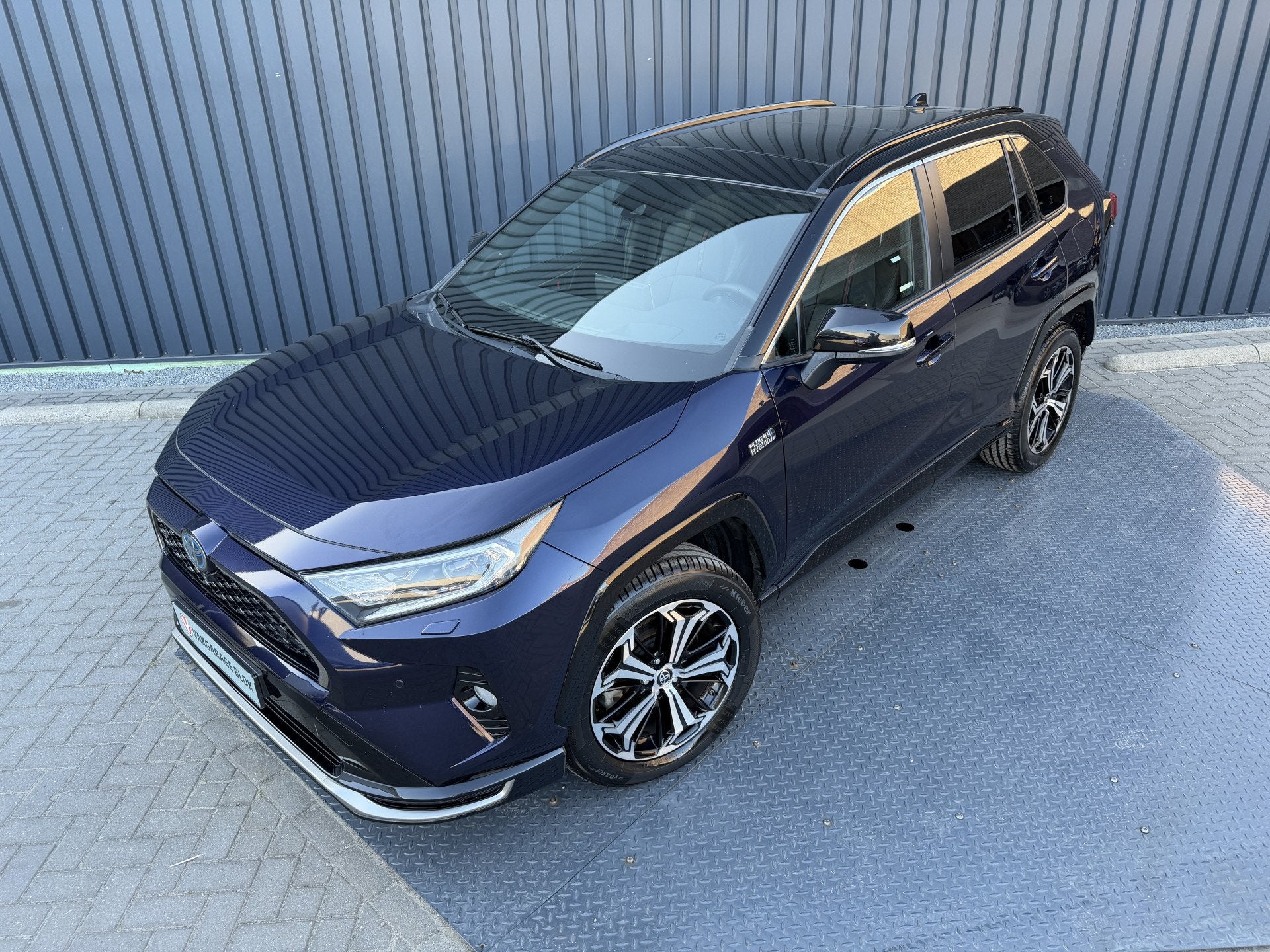 Toyota RAV4 2.5 Plug-in Hybrid AWD Bi-Tone Plus |Top kleur M, Automaat, Gebruikt, Zwart, 4 cilinders
