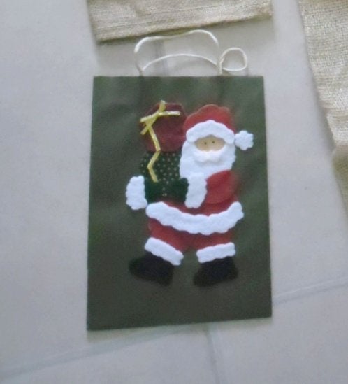 geschenkzakje /cadeau-zakje met Kerstman Kerstmis / sierlint, Ophalen of Verzenden, Nieuw