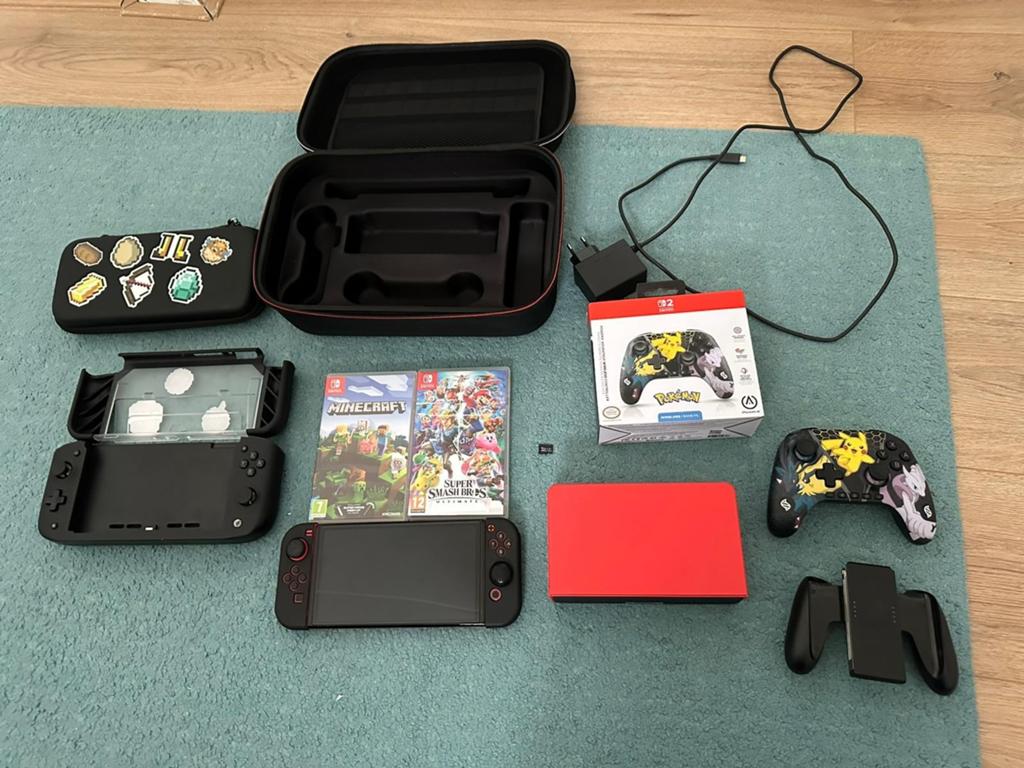 Nintendo Switch Oled met verschillende games en accessories, Spelcomputers en Games, Games | Nintendo Switch, Ophalen, Zo goed als nieuw