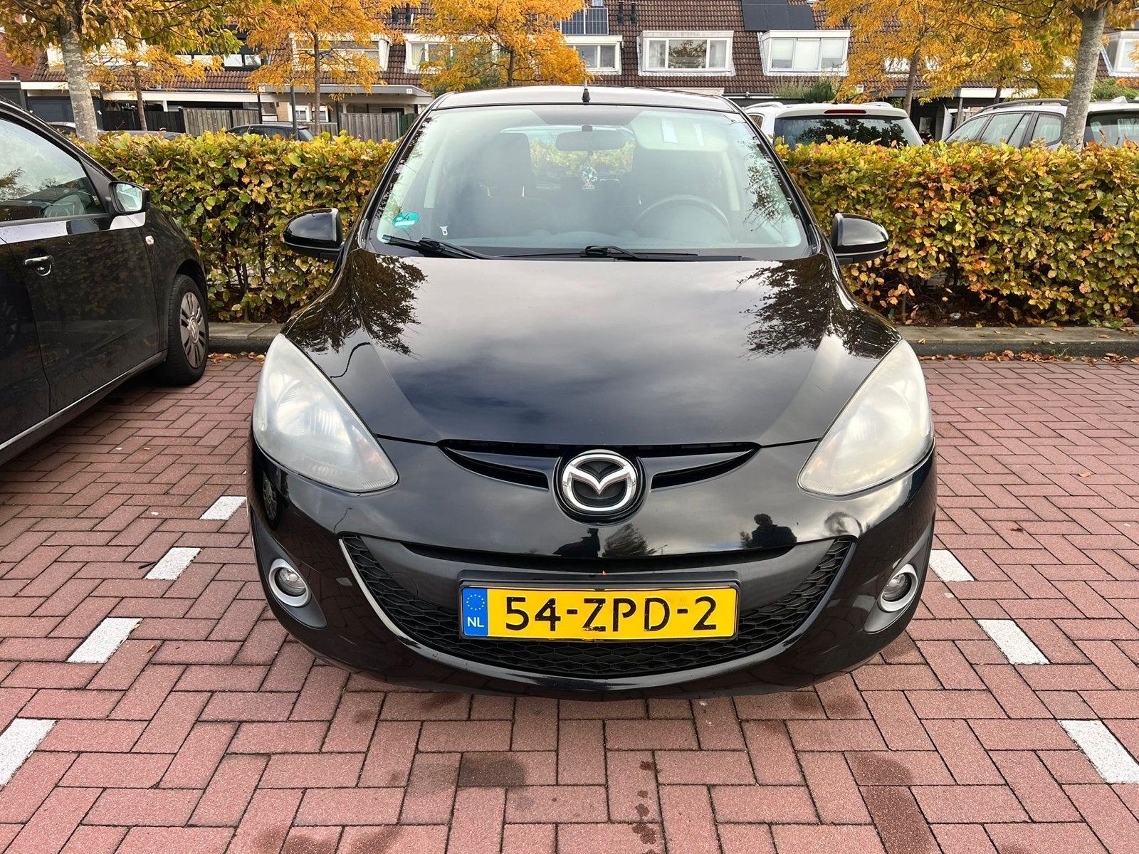 Mazda 2 1.3 Bifuel 62KW 5DRS 2013 Zwart, Voorwielaandrijving, 15 km/l, 37 €/maand, 4 cilinders