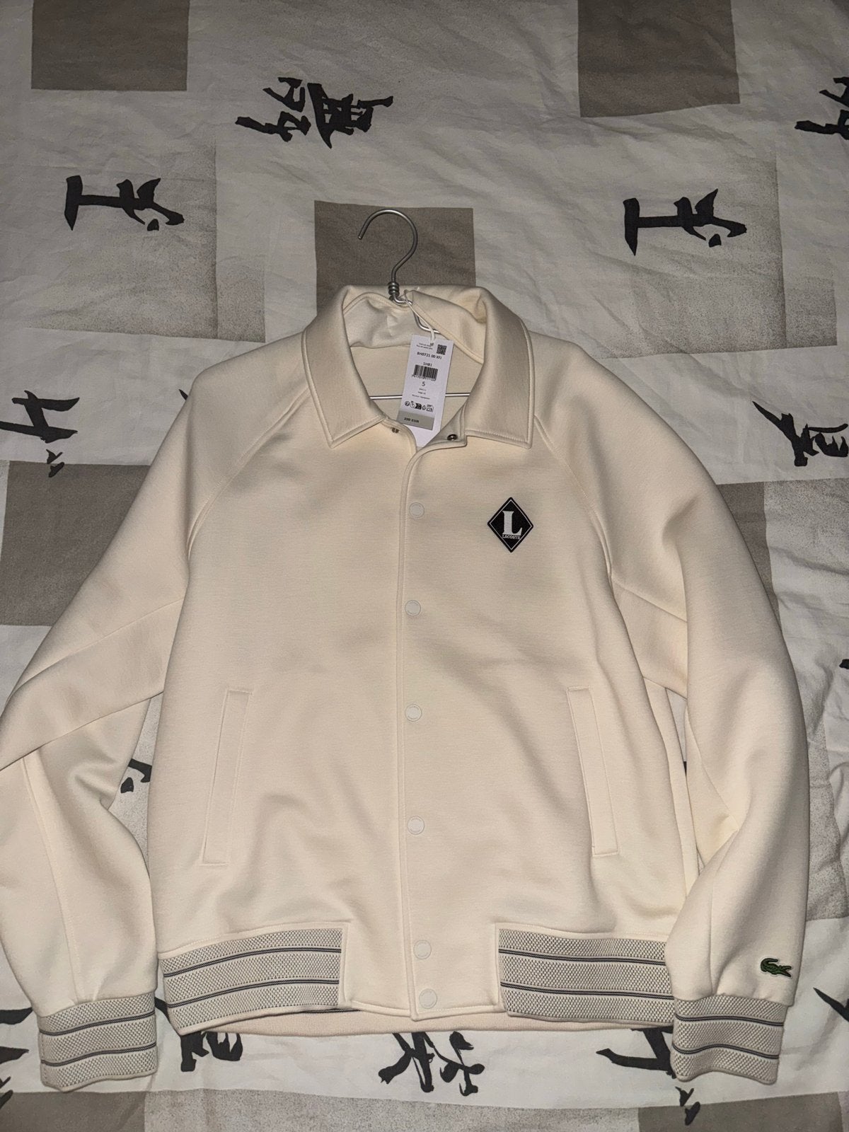 Lacoste Bomberjack - Nieuw met kaartje, Ophalen of Verzenden, Nieuw, Maat 52/54 (L), Beige