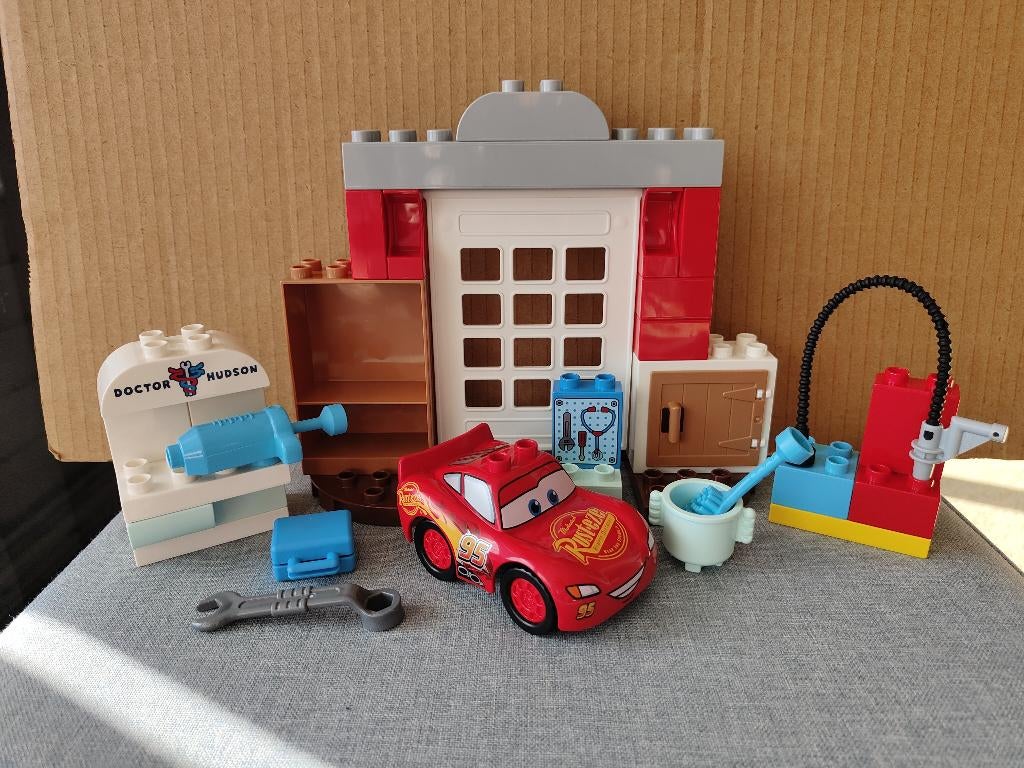 Lego Duplo 10456 McQueen's Visit to Doc's Garage, Ophalen of Verzenden, Zo goed als nieuw, Duplo, Compleet