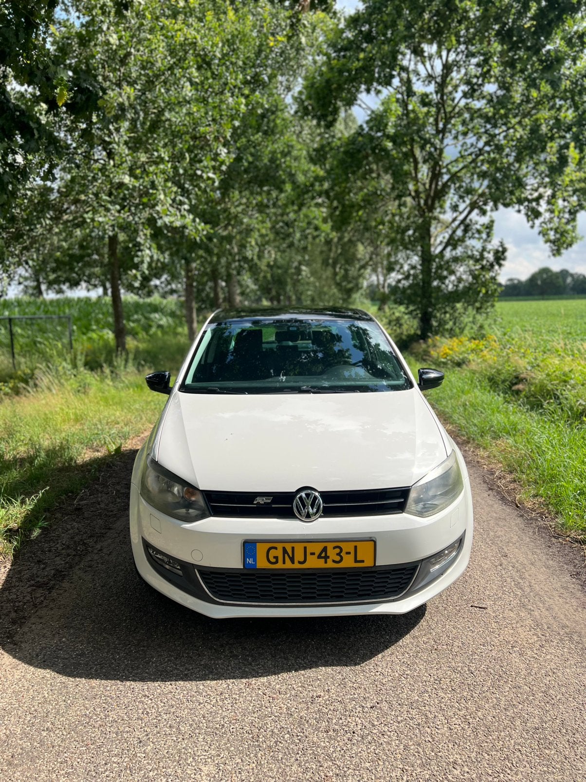Volkswagen Polo 1.2 51KW 2012 Wit, Auto's, Volkswagen, Voorwielaandrijving, 1198 cc, Wit, Handgeschakeld