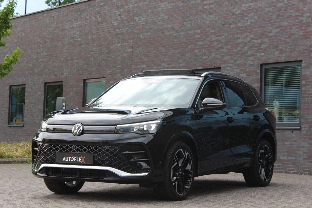 Volkswagen Tiguan 1.5 eHybrid R-Line Edition, Auto's, 150 pk, Leder en Stof, Zwart, Plug-in hybride