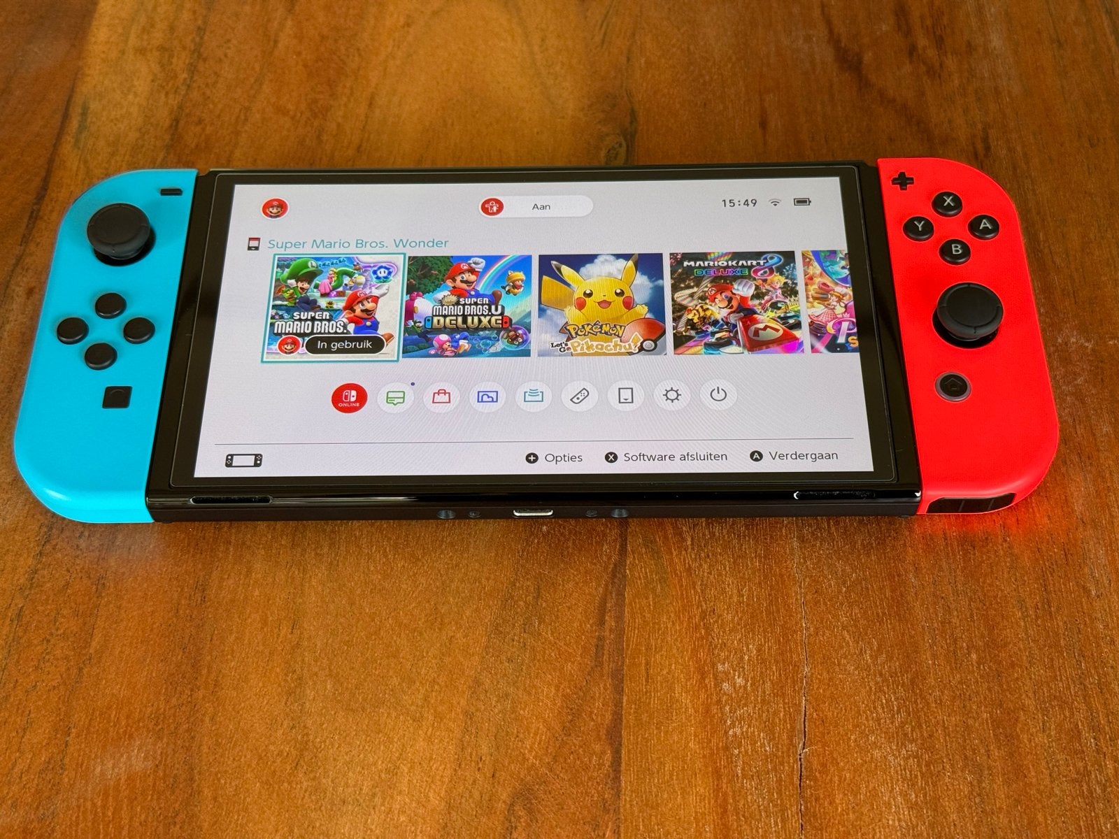 Nintendo Switch OLED met extra controllers en games, Switch OLED, Met games, Ophalen of Verzenden, Zo goed als nieuw