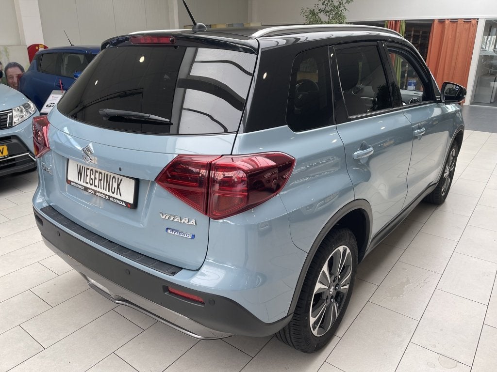 Suzuki Vitara 1.4 Style Hybrid [ 1e EIGENAAR I DEALER OH I T, Auto's, Gebruikt, 4 cilinders, Blauw, 49 €/maand