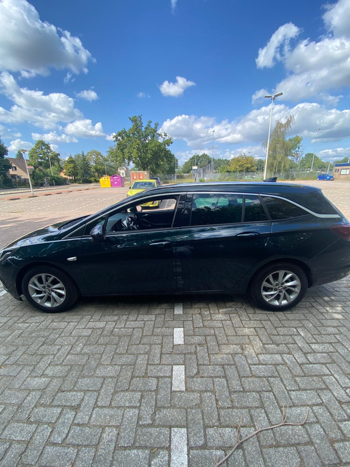 Opel Astra 1.0 Turbo 77KW Sports Tourer AUT 2017 Groen, Stof, 1178 kg, 620 kg, Origineel Nederlands
