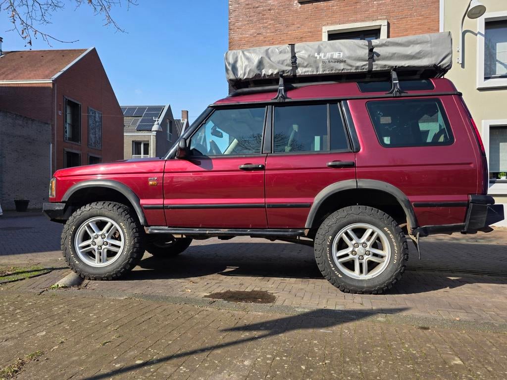 Land Rover Discovery 2 4.6 2004 Rood Nieuwe APK, Auto's, Land Rover, 4x4, ABS, Airbags, Airconditioning, Alarm, Bluetooth, Centrale vergrendeling